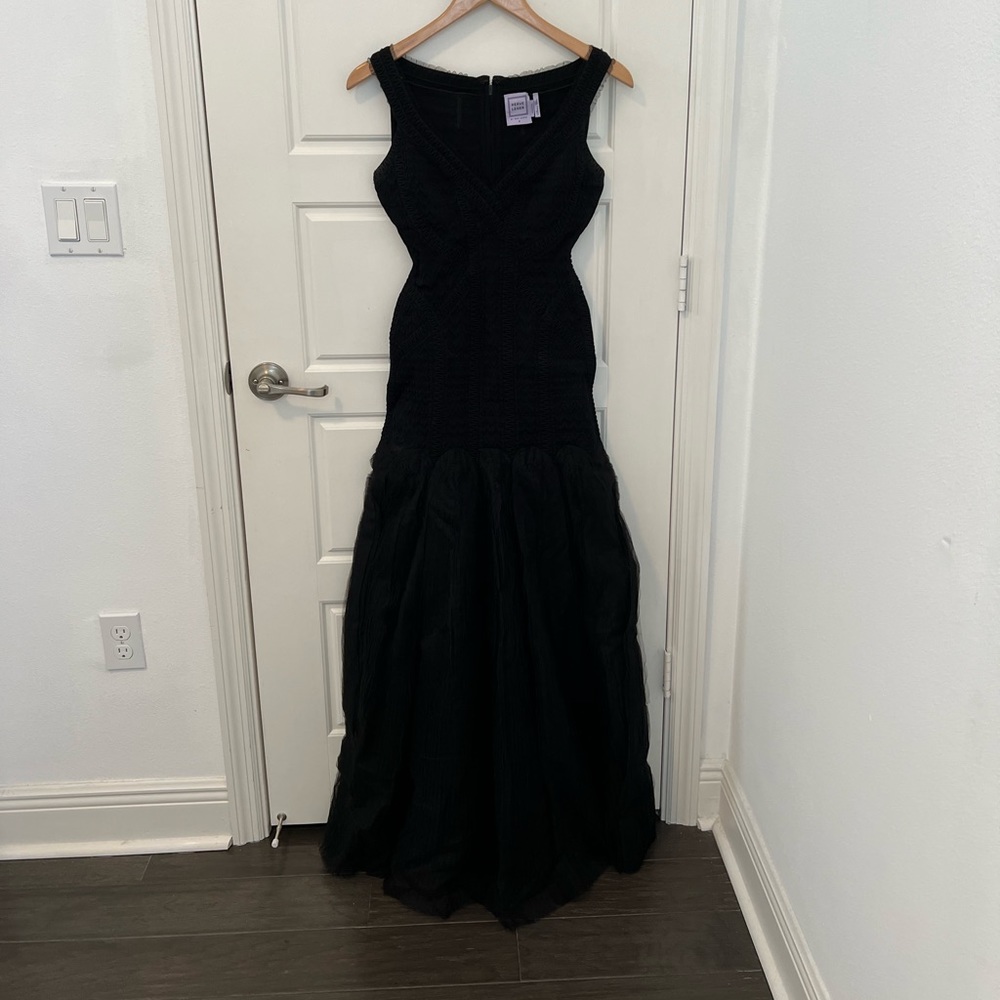 Herve Leger by Max Azria gown.